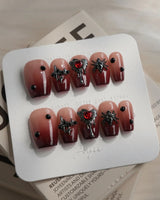 Crimson Veil press-on nails in short coffin shape — Red & Black Gradient, 3D Punk Heart & Spider.