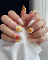 Caramel Bloom press-on nails in XS medium almond with caramel florals and glossy fall color