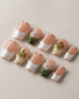 Duchess Olive nails with raised olive florals, nude base, and glossy gel finish