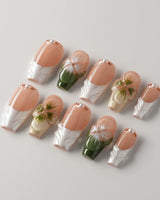 Duchess Olive press-ons with sculpted green floral accents and elegant French tips