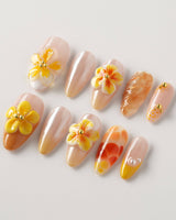 Caramel Bloom press-on nails in S medium almond with warm caramel flower accents