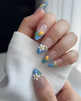 Lemon Grove nail art close-up showing Blue French, 3D Lemon & Florals. details