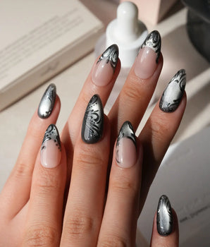 Damask press on nails with freehand black filigree scrollwork and a butterfly on nude and silver cat eye - image 2