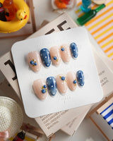 Denim Berry glossy blue summer nails with sculpted blueberry clusters