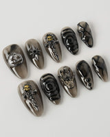 Devil Charm press-on nails in short almond shape — Sheer Black Gothic, 3D Skull & Dark Aesthetic.