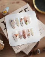 Dew Wing press-on nails in medium almond shape — Dreamy Night, Metallic Relief Dragonflies & Fluid Butterfly Wings.