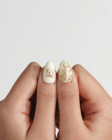 Double Love press-on nails in extra short almond shape — Creamy White Cute Healing, 3D Cats & Golden Flowers.