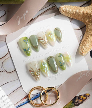 Dreamland handmade press-on nails featuring Sage Green Cat-eye, 3D Gold Butterfly & Vines