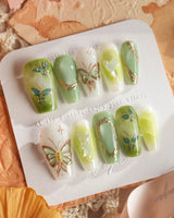 Dreamland dimensional butterfly press-on nails with layered green cat-eye wings