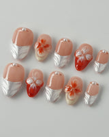 Duchess Marigold extra short almond nails with orange 3D floral French design