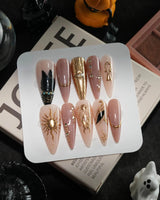 Egyptian Gold handmade press-on nails in long stiletto shape by Joyee Nails