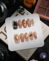 Egyptian Gold handmade press-on nails in short coffin shape by Joyee Nails