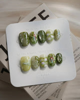 Emerald Wild press-on nails in extra short oval shape — Mori Monet's Garden, Hand-painted Forest Fairies & 3D Water Droplets.