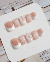 Engagement press-on nails in extra short squoval shape — Elegant Style, Pearl Outlines & 3D Ribbon Bows.