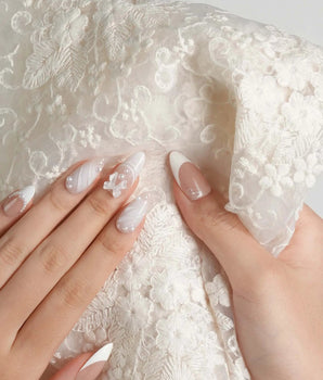 Engagement handmade press-on nails featuring Elegant Style, Pearl Outlines & 3D Ribbon Bows.