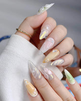 Fairy Bay reusable press-ons with dreamy island-inspired flower and starfish nail art