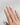 Yellow beach-inspired nail with shell detail