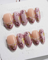 Falling Sakura press-on nails in medium oval shape — Elegant Rosy Mauve, Hand-painted Blooms & Pearls.