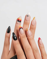 FIFA Germany short almond nails with bold Schwarz-Rot-Gold color-block French tips