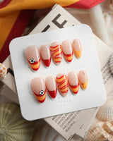 FIFA Spain custom size nails with sculpted soccer ball charms and Spanish flag inspiration