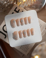 First Flake nails in short oval — Icy Milky White &