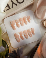 Fleur Fantasy handmade press-on nails featuring white floral french tip nails