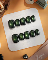 Forest Green Chase press-on nails in extra short squoval shape — Forest green cat eye