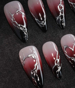 Fracture press on nails with sculpted mirror silver cracks over a nude to wine red to black gradient - image 1