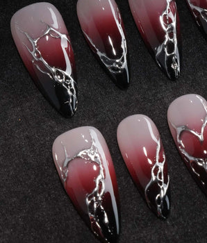 Fracture press on nails with sculpted mirror silver cracks over a nude to wine red to black gradient - image 1