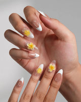 Fresh Spring nail art close-up showing Summer Plumeria, French Pearls & 3D Flowers. details
