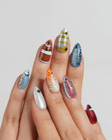 Funky Fish close-up of tropical fish press-on nails with raised googly eyes