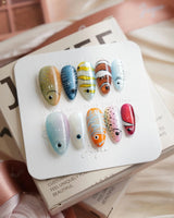 Funky Fish tropical fish press-on nails in medium almond shape