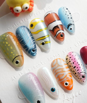 Funky Fish handmade press-on nails featuring fish nail art