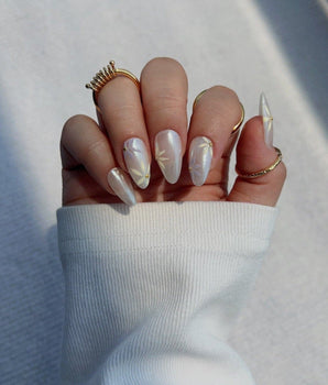 Garden Party handmade press-on nails featuring minimal floral french tip