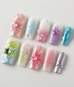 Gem Blossom press-on nails in medium square shape — pastel mix design chrome iridescent flower pearl butterfly 3D accents