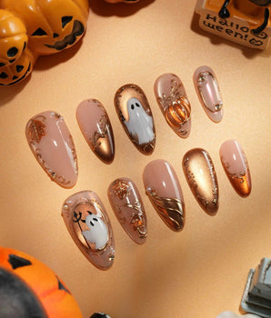 Ghost Portrait press on nails with ghosts in raised gold frames, gold filigree, pearls and a 3D copper pumpkin on copper cat eye - image 1