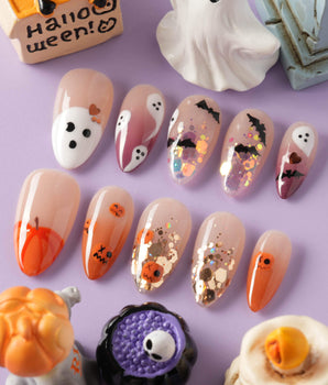 Ghostlight handmade press-on nails featuring Playful Halloween, Pumpkin & Ghost Glitters.