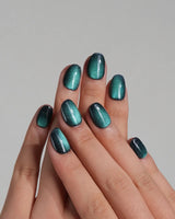 Glint Aurora nail art close-up showing deep teal cat eye shimmer details