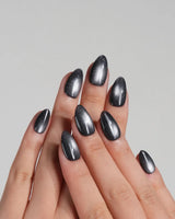 Glint Tahiti handmade press-on nails featuring gunmetal cat eye shimmer