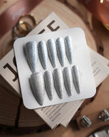 Glitter Frost press-on nails in long stiletto shape — silver glitter