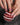 Glossy Christmas nails with red ribbon and candy patterns