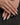Glossy green French nails with metallic finish