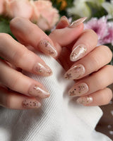 Glow Petals press-on nails — Gentle Nude Pink, Rose Gold Flowers & Gold Flakes. handmade nail art by Joyee Nails