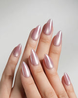 Glow Pop short almond nails with rose pink cat-eye shimmer and mirror chrome overlay