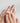Nude shimmer nails with silver starfish charm