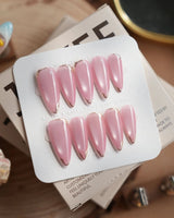 Glowing Stone - New Edition press-on nails in medium stiletto shape — Gentle Rose Cat Eye, Simple Silver Outlines.