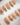 Gold glitter Christmas nails with festive details