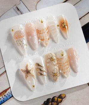 Golden Bay press-on nails — Pearly Milky White, 3D Shells & Gold Wire Florals. handmade nail art by Joyee Nails
