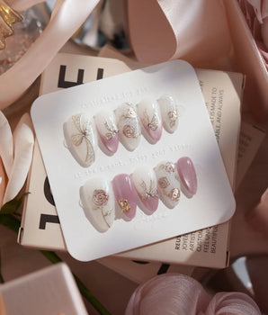 Golden Hour handmade press-on nails featuring Romantic Dusty Pink Gradient, 3D Metallic Roses & Silver Ribbon.