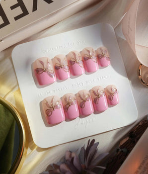 Gorg Bow nails in extra short square — Sweet Barbie Pink, Golden